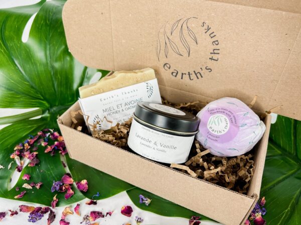Relaxing spa gift set including a moisturizing bath bomb, an exfoliating soap and a soy candle