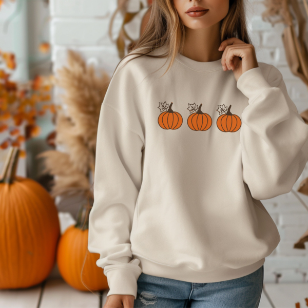 Embroidered pumpkins on Sweater
