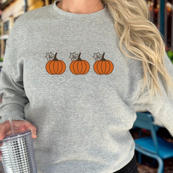 Embroidered pumpkins on Sweater