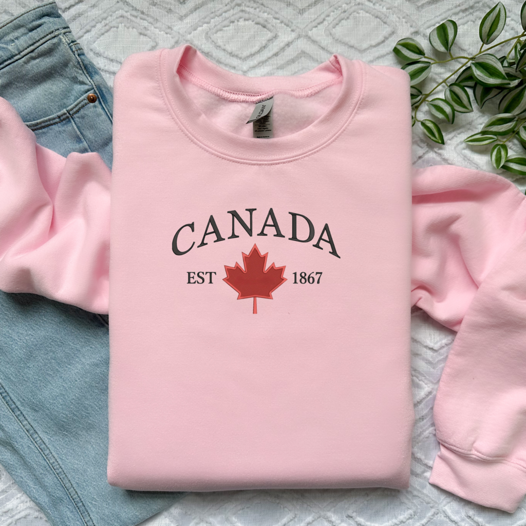 pink sweater with canada