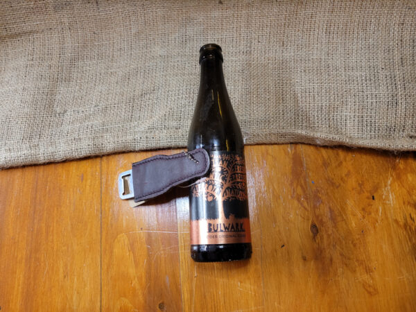 Leather covered bottle opener