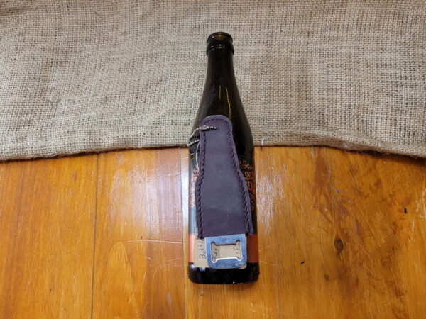 Leather covered bottle opener