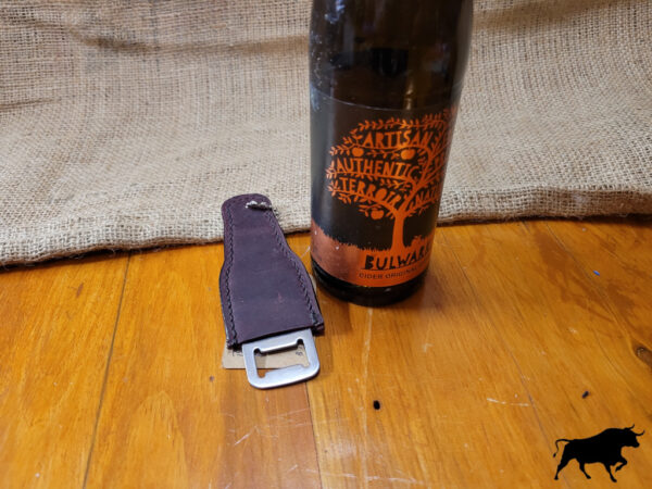 Leather covered bottle opener