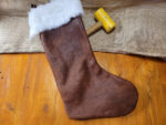 Hand made leather Christmas stocking with faux fleece topping