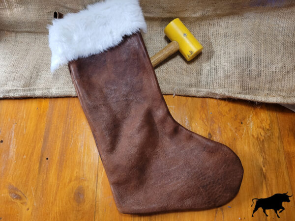 Hand made leather Christmas stocking with faux fleece topping