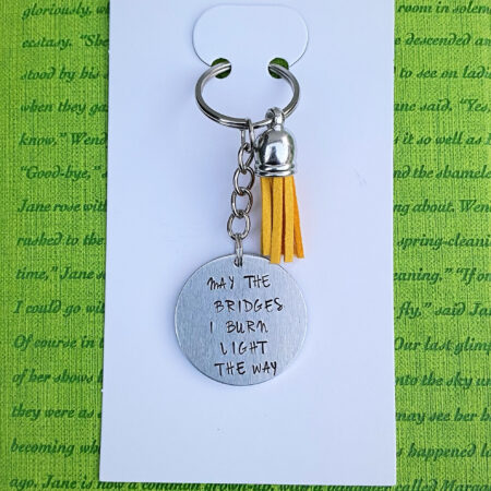 ‘may the bridges I burn light the way’ hand stamped keychain