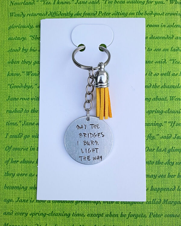 ‘may the bridges I burn light the way’ hand stamped keychain