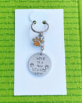 ‘love is a four legged word’ hand stamped keychain