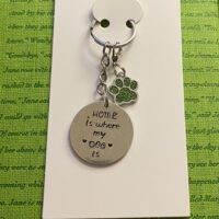 ‘home is where my dog is’ hand stamped keychain