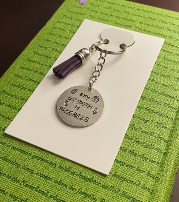 ‘any growth is progress’ hand stamped keychain