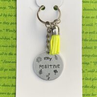 ‘stay positive’ hand stamped keychain
