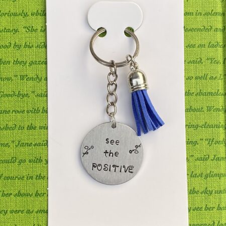 ‘see the positive’ hand stamped keychain
