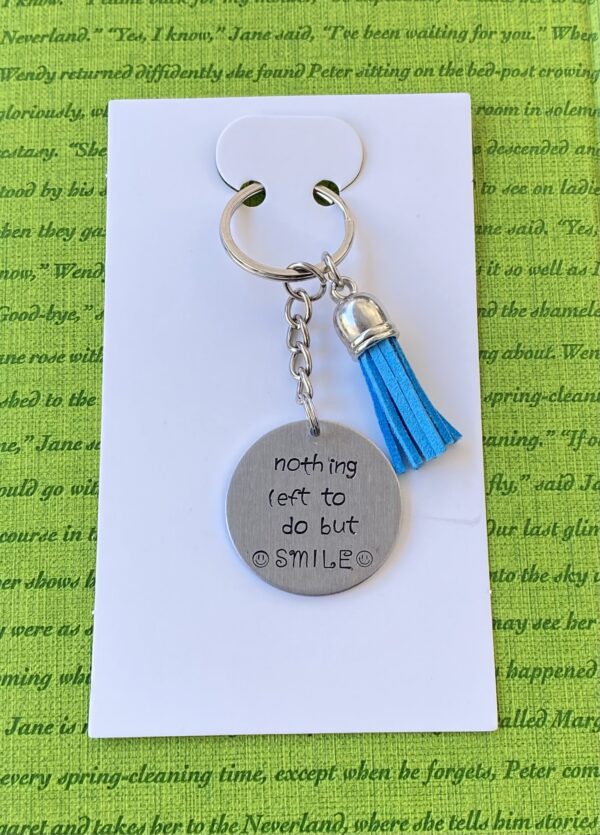 ‘nothing left to do but smile’ hand stamped keychain