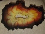 Firelight Resin geode slice with center ring of crystals-stand included
