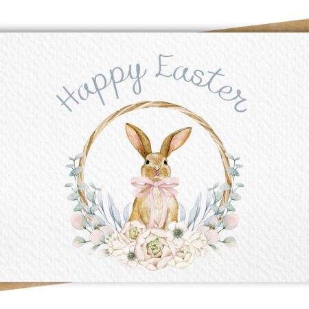 Paper Kuts - An Easter card with a watercolour floral wreath surrounding an adorable bunny