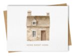 New home greeting card displaying a watercolour stone house