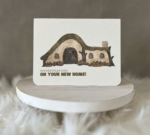 New home greeting card including a watercolour hobbit style house