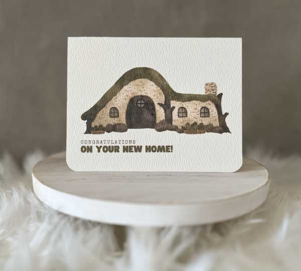 New home greeting card including a watercolour hobbit style house