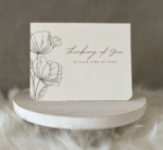 Sympathy card displaying teal tulips and a comforting sentiment