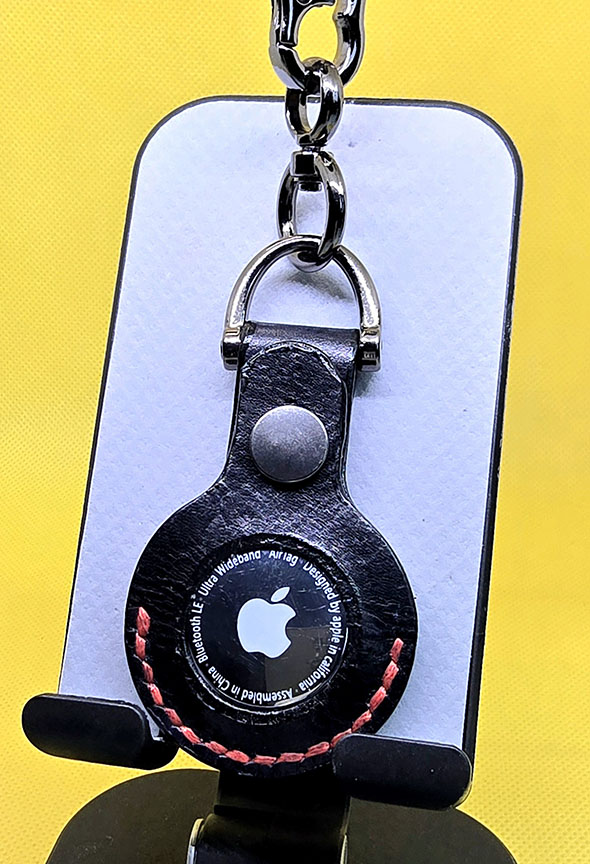 Apple AirTag Holder with Debossed Guns and Red Stitching Handcrafted from Premium Quality Veg-Tanned Leather