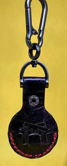 Apple AirTag Holder with Debossed Guns and Red Stitching Handcrafted from Premium Quality Veg-Tanned Leather