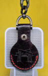 Apple AirTag Holder with Debossed Guns and Red Stitching Handcrafted from Premium Quality Veg-Tanned Leather