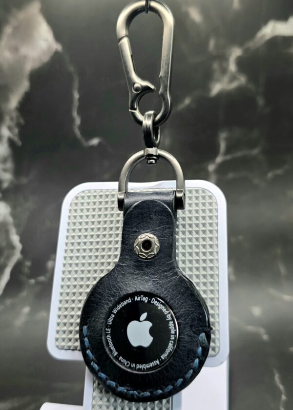Veg-tanned Leather Apple AirTag Holder with Navy Handled Guns Handcrafted from Premium Quality Veg-Tanned Leather