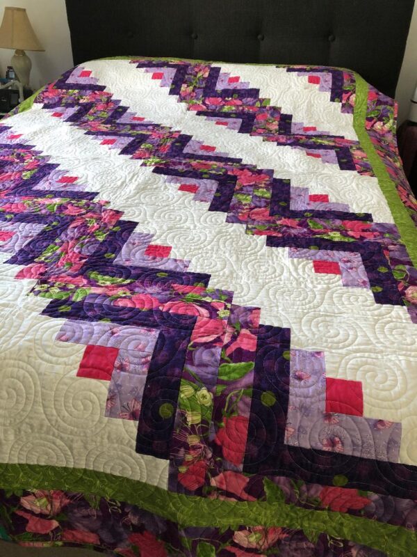 Handmade Fields and Furrows Log Cabin quilt