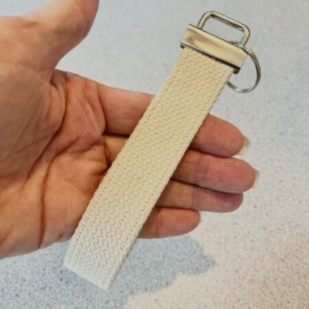 blank key fob in hand