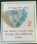 A Hug For You card with medium glass pocket heart "My heart is with you during this difficult time"