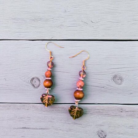 Green leaf with three beads