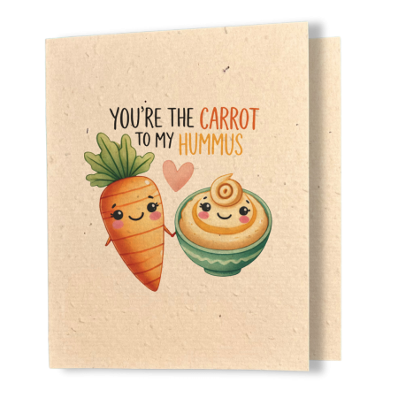 plantable greeting card, natural coloured paper, embedded with wildflower seeds, an image in kawaii style of a carrot and a bowl of hummus holding hands, the sentiment reads you're the carrot to my hummus.