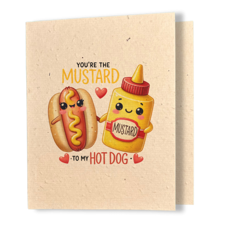 plantable greeting card, natural coloured paper, embedded with wildflower seeds, an image in kawaii style of of a hot dog and a bottle of mustard holding hands, the sentiment reads, you're the mustard to my hot dog