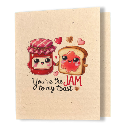 plantable greeting card, natural coloured paper, embedded with wildflower seeds, an image in kawaii style of a homemade jar of jam and a slice of toast with jam on it holding hands, the sentiment reads, you're the jam to my toast