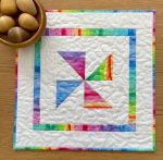 Quilted Colourful Pinwheel Table Topper