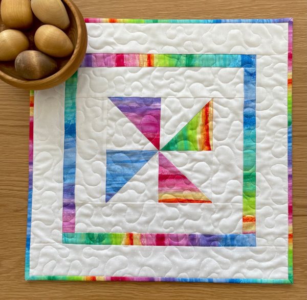 Quilted Colourful Pinwheel Table Topper