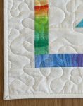 Quilted Colourful Pinwheel Table Topper