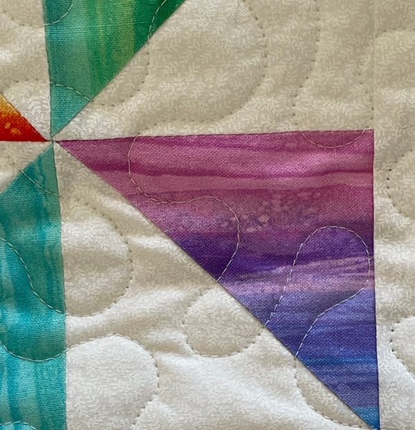 Quilted Colourful Pinwheel Table Topper
