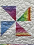 Quilted Colourful Pinwheel Table Topper