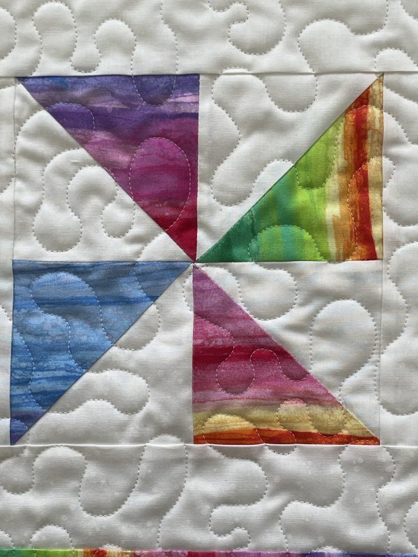 Quilted Colourful Pinwheel Table Topper