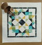 Quilted Star Burst Table Topper