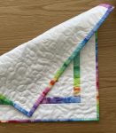 Quilted Colourful Pinwheel Table Topper