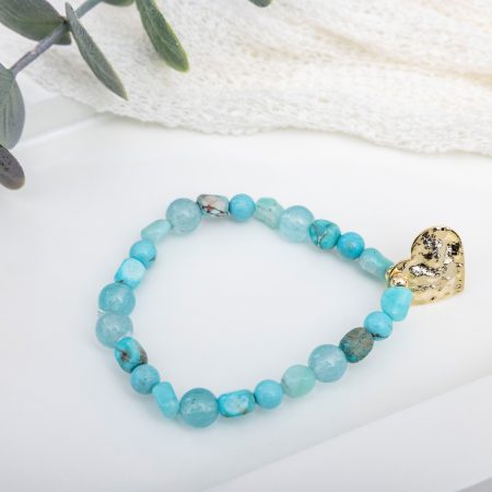 Stretch bracelet with Arizona turquoise, amazonite, and jade beads centered by a hammered gold heart charm.