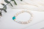 Freshwater Pearl Stretch Bracelet — Amazonite Center with Gold Heart Charms