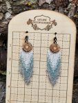 ​Sunburst Horizon Beaded Fringe Earrings – Hand-Engraved Wood and Iridescent Blue Ombre Tassel Earrings – Celestial Boho Jewelry
