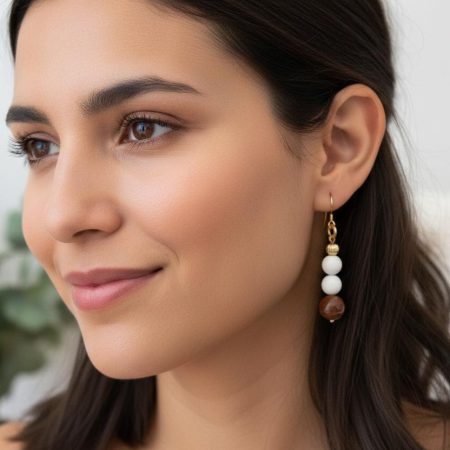 Dangle earrings with matte white magnesite beads, Australian jasper beads, corrugated 14K gold‑filled spacer beads, finished on 14K gold‑filled hooks.
